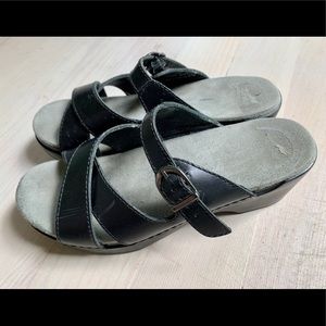 Dansko black leather wedge sandals, women’s